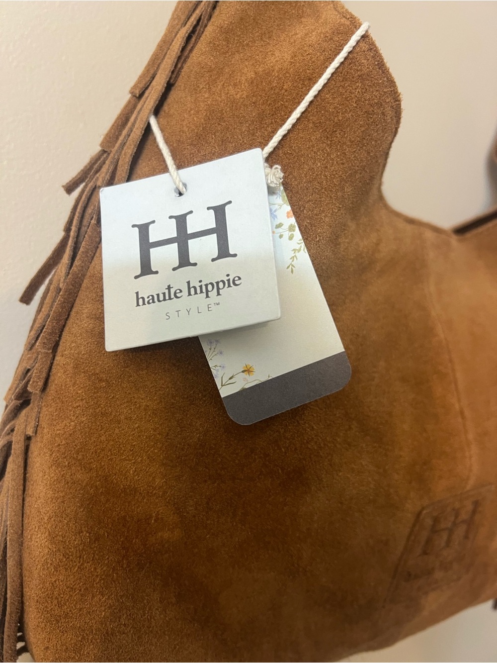 Haute Hippie brown suede hobo bag featuring long fringe detailing on the sides. - Picture 3 of 5